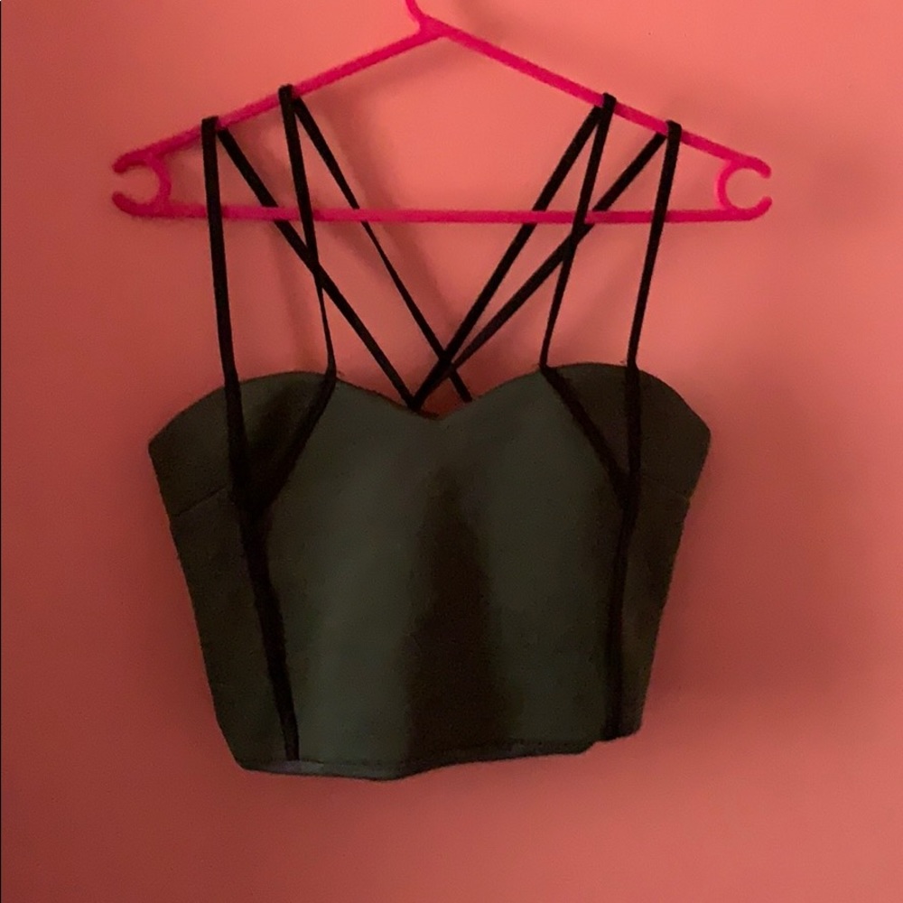 Green crop top with black straps